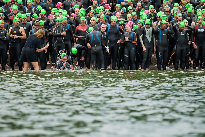 &lt;p&gt;GABE GREEN/Press A swimmer at City Beach in Coeur d'Alene acclimates to the frigid waters before te start of the 2012 Ironman triathlon on Sunday.&lt;/p&gt;