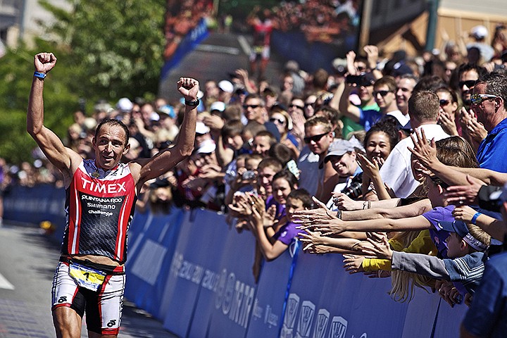 &lt;p&gt;JEROME A. POLLOS/Press Three-time Ironman Coeur d'Alene winner Victor Zyemtsev takes a victory lap in the finish line area after completing the course Sunday with a time of 8:32:29.&lt;/p&gt;