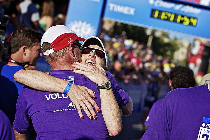 &lt;p&gt;JEROME A. POLLOS/Press Chrystie Hjeltness, from Coeur d'Alene, receives a hug from her boyfriend after crossing the finish line with a time of 11:47:36.&lt;/p&gt;