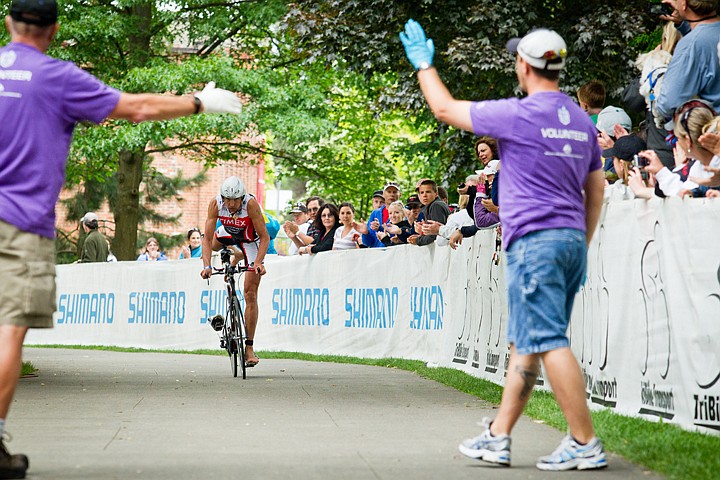 &lt;p&gt;GABE GREEN/Press Viktor Zyemtsev, in first place, dismounts his bike at the transition point at City Park during the 2012 Ironman Triathlon in Coeur d'Alene Idaho.&lt;/p&gt;