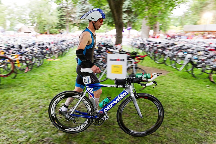 &lt;p&gt;SHAWN GUST/Press Tyler King, of Atlanta, Georgia, races his bike to the out gate Sunday, beginning the bike portion of the Ironman triathlon.&lt;/p&gt;