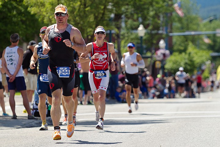 &lt;p&gt;SHAWN GUST/Press Roger Sherwood, of Enumclaw, Washington, strides ahead of other racers on Lakeside Avenue in Coeur d'Alene during the 26.2-mile run portion of the Ironman.&lt;/p&gt;