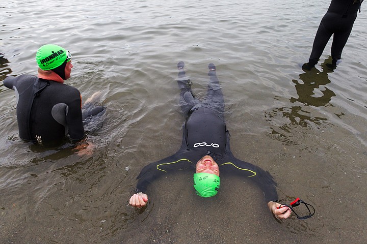 &lt;p&gt;SHAWN GUST/Press Michael Pickering, of Drewsville, New Hampshire, lies on his back in the shallow waters of Lake Coeur d'Alene prior to the start of the 2012 Ironman.&lt;/p&gt;