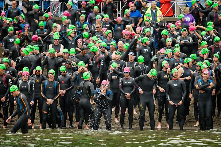 &lt;p&gt;GABE GREEN/Press Ironman competitors prepare for their 2.4 mile swim around Lake Coeur d'Alene on the city beach Sunday morning.&lt;/p&gt;