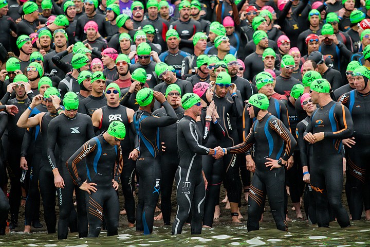 &lt;p&gt;GABE GREEN/Press Two Ironman competitors shake hands before the start of the 2012 race Sunday morning in Coeur d'Alene, Idaho.&lt;/p&gt;