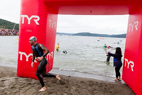 &lt;p&gt;Bryan Rhodes is the first pro to finish the 2.4-mile swim leg of the Ironman in Coeur d'Alene.&lt;/p&gt;