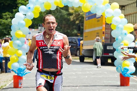 &lt;p&gt;Leader of the men's division, Viktor Zyemtsev, rallies the crowds along Lakefront Boulevard during the 2012 Ironman Triathlon in Coeur d'Alene, Idaho.&lt;/p&gt;