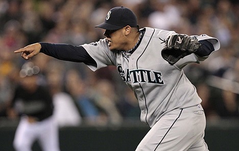 &lt;p&gt;Seattle's Felix Hernandez reacts after striking out Florida's John Buck in the fourth inning Friday night at Seattle. The Mariners beat the Marlins 5-1.&lt;/p&gt;