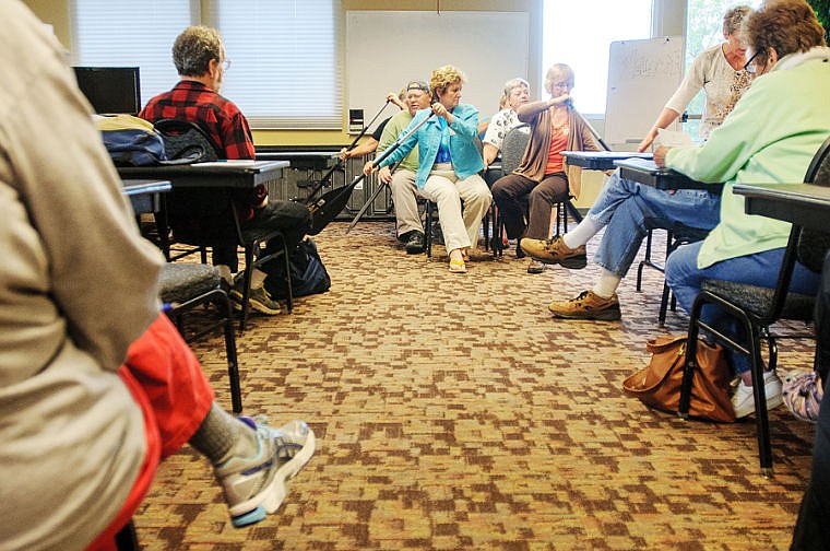 &lt;p&gt;Before getting in the water, members of the Journey to Wellness Dragon Boat teams practice in chairs Thursday evening during in a conference room at The Summit. June 20, 2013 in Kalispell, Montana. (Patrick Cote/Daily Inter Lake)&lt;/p&gt;