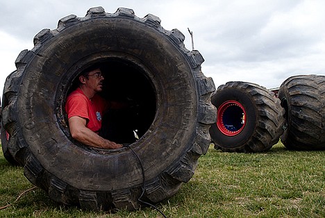 &lt;p&gt;Jimmy Walker, driver of the Ice Cream Man, fixes one of his truck&#146;s tires in preparation for the All Star Monster Truck Mash-Up this weekend.&lt;/p&gt;