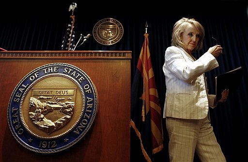 &lt;p&gt;Arizona Gov. Jan Brewer leaves a news conference responding to the United States Supreme Court decision regarding Arizona's controversial immigration law, SB1070, coming down at the Arizona Capitol Monday, June 25, 2012, in Phoenix. The Supreme Court struck down key provisions of Arizona&#146;s crackdown on immigrants Monday but said a much-debated portion on checking suspects&#146; status could go forward. (AP Photo/Ross D. Franklin)&lt;/p&gt;