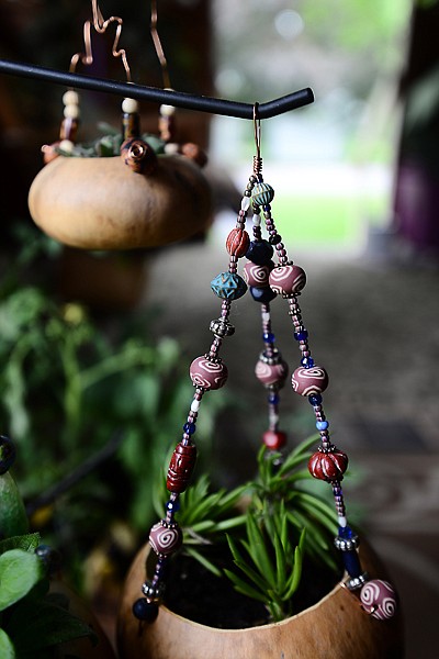 &lt;p&gt;Carolyn Snyder is adding a new addition to her collection &#151; hanging plants decorated with strands of beads. (Brenda Ahearn/Daily Inter Lake)&lt;/p&gt;