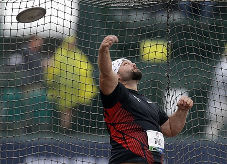 &lt;p&gt;Ian Waltz throws during a qualifying round for the men's discus at the U.S. Olympic Track and Field Trials Monday, June 25, 2012, in Eugene, Ore. (AP Photo/Matt Slocum)&lt;/p&gt;