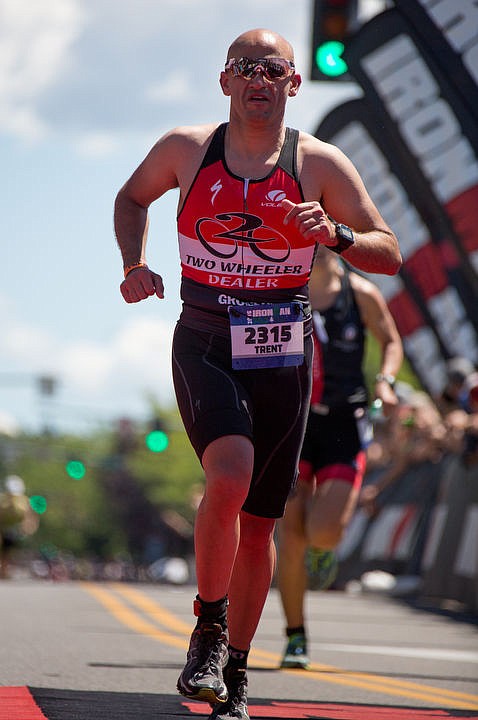 <p>For the first time ever, Coeur d'Alene hosted a half-Ironman triathlon, a race involving a 1.2 mile swim, 56 mile bike and a 13.1 mile run. With 2,449 athletes participating, tens of thousands of spectators lined the streets and beaches of Coeur d'Alene. Andy Potts clinched first place in the men's professional bracket, while Heather Jackson crossed the finish line first in the professional women's bracket. Coeur d'Alene will host its annual full-Ironman triathlon on August 21, 2016. To purchase photo, please visit www.cdapress.com</p>