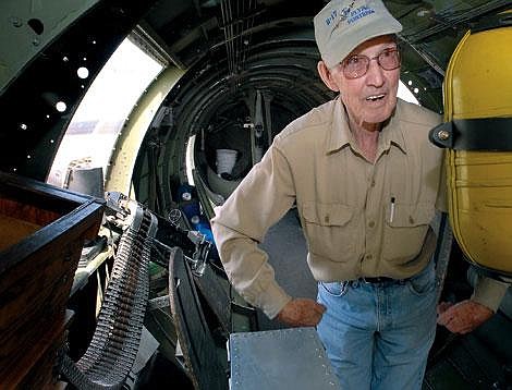 Eureka pilot Orvin Larson, who served as an engineer gunner on a B-17 during World War II, reflects on his 550 hours aboard the bomber Wednesday while he was taking a tour of a restored B-17 as part of the Wings of Freedom Tour. The B-17, as well as B-25 Mitchell, a B-24 Liberator and a P-51 Mustang, are on view and available for tours through 5 p.m. today outside the Semitool hangar north of Glacier Park International Airport. Karen Nichols/Daily Inter Lake