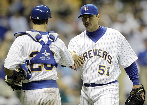 &lt;p&gt;Milwaukee catcher Jonathan Lucroy (20) congratulates relief pitcher Trevor Hoffman after the Brewers defeated the visiting Seattle Mariners 8-3 on Friday.&lt;/p&gt;