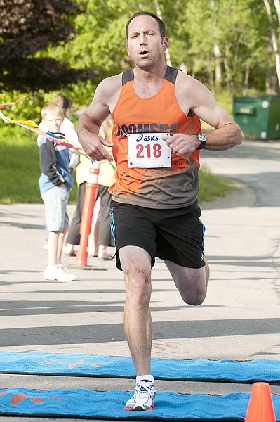 <p>Steve Morley finishes the Whitefish Lake Run Saturday
morning.</p>