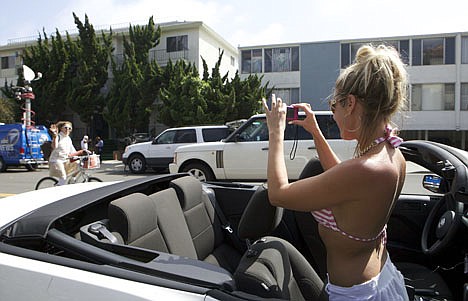 &lt;p&gt;Boston tourist Tiffany Jones drives by to take photos of the apartment building where fugitive crime boss James &quot;Whitey&quot; Bulger was arrested in Santa Monica, Calif., on Friday.&lt;/p&gt;