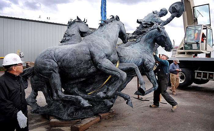 &lt;p&gt;Laird Hill of Crystal Service; a specialized moving company out of Calgary, carefully secures the final piece of the sculpture By the Banks of the Bow for loading on Tuesday morning, June 19, at Kalispell Art Casting.&lt;/p&gt;