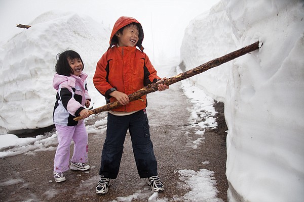 &lt;p&gt;Four-year-old Candice Ngan, left, and her 6-year-old brother Cyrus, from Portland, Ore., were among the first visitors to Logan Pass in Glacier National Park on Tuesday. The long-awaited opening of Going-to-the-Sun Road over the pass occurred around noon.&lt;/p&gt;