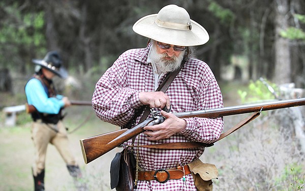 Matt Denison of Superior, right, and Dean Hazuka of Marion prepare to take their shots on Saturday at the Merical Mountain Rendezvous in Marion.