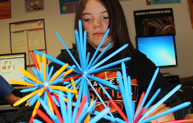 &lt;p&gt;Ronan Middle School student Maddy, 12, adjusts a firework designed by Michelle Davis.&lt;/p&gt;