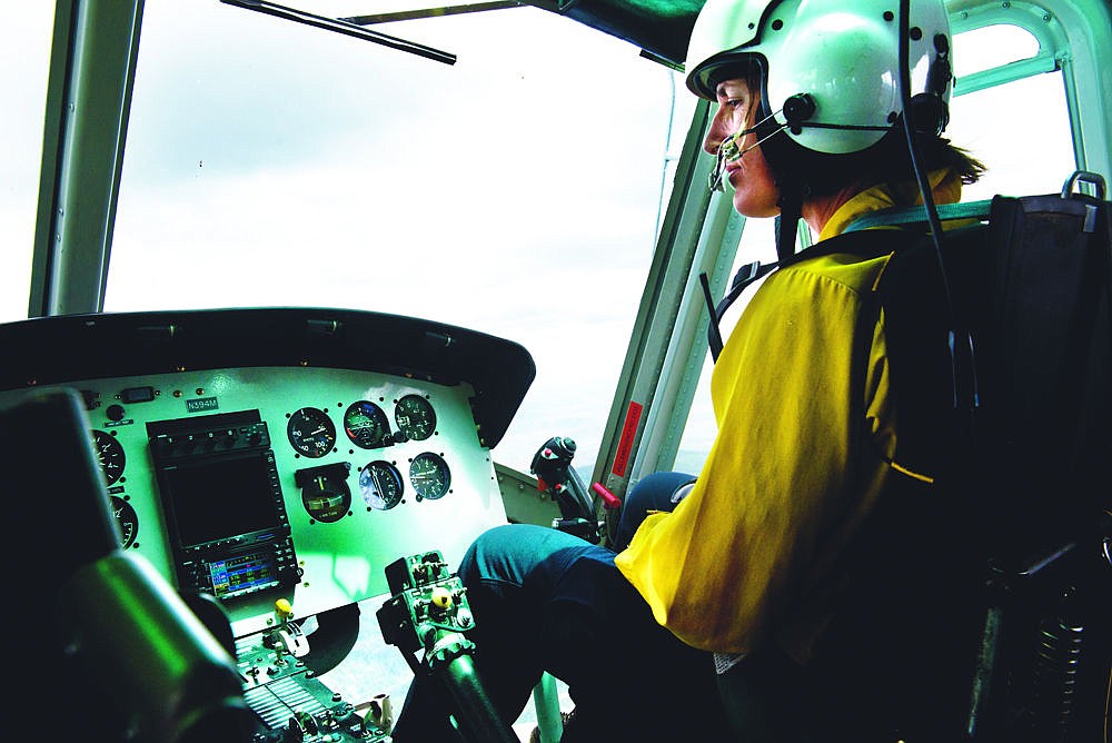 &lt;p&gt;DNRC flight crew member Jessica Fuqua rides as an extra pair of eyes during a training flight over the Clark Fork River Valley.&lt;/p&gt;