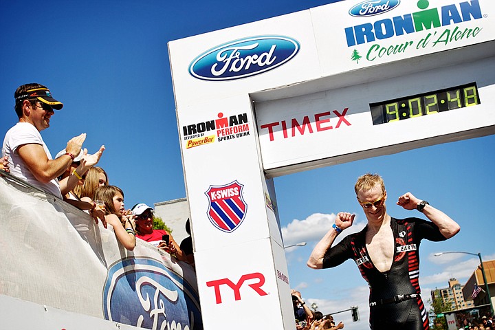 &lt;p&gt;JEROME A. POLLOS/Press Coeur d'Alene's Brian Hadley crosses the finish line in fourth place overall in his seventh Ironman event.&lt;/p&gt;