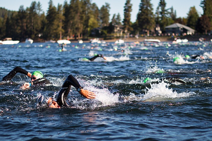 &lt;p&gt;SHAWN GUST/Press An age group competitor swims among thousands in the first lap of the 2.4-mile leg of Sunday's Ironman Coeur d'Alene.&lt;/p&gt;