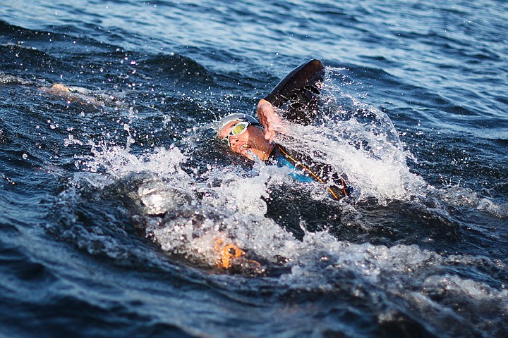 &lt;p&gt;SHAWN GUST/Press A professional triathlete races another competitor in the swim portion of the Ironman.&lt;/p&gt;