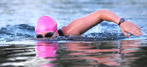 Emily von Jentzen swims in Flathead Lake near Somers on Friday morning. Jentzen said that one of the challenges of lake swimming is that the swimmer must constantly look up to breathe and spot for boats, jet skis and others.