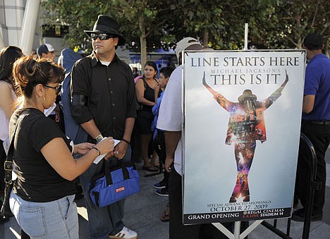 &lt;p&gt;In this Sept. 24, 2009 file photo, Michael Jackson fans arrive to buy tickets for the &quot;Michael Jackson's This Is It&quot; film, at L.A. Live in Los Angeles.&lt;/p&gt;