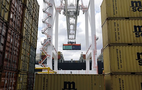 &lt;p&gt;A crane removes a container from a ship at the Port of Baltimore's Seagirt Marine Terminal in Baltimore on March 1. The government issues its third and final estimate of economic growth in the January-March quarter, Wednesday.&lt;/p&gt;