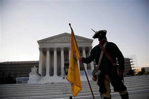 &lt;p&gt;William Temple, of Brunswick, Ga., waits outside the Supreme Court a landmark decision on health care on Thursday, June 28, 2012 in Washington. (AP Photo/Evan Vucci)&lt;/p&gt;