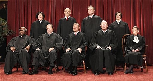 &lt;p&gt;This Oct. 8, 2010 file photo shows the justices of the U.S. Supreme Court at the Supreme Court in Washington. Seated from left are Associate Justices Clarence Thomas, and Antonin Scalia, Chief Justice John Roberts, Associate Justices Anthony M. Kennedy and Ruth Bader Ginsburg. Standing, from left are Associate Justices Sonia Sotomayor, Stephen Breyer, Samuel Alito Jr., and Elena Kagan. The Supreme Court on Thursday, June 28, 2012, upheld the individual insurance requirement at the heart of President Barack Obama's historic health care overhaul. (AP Photo/Pablo Martinez Monsivais, File)&lt;/p&gt;