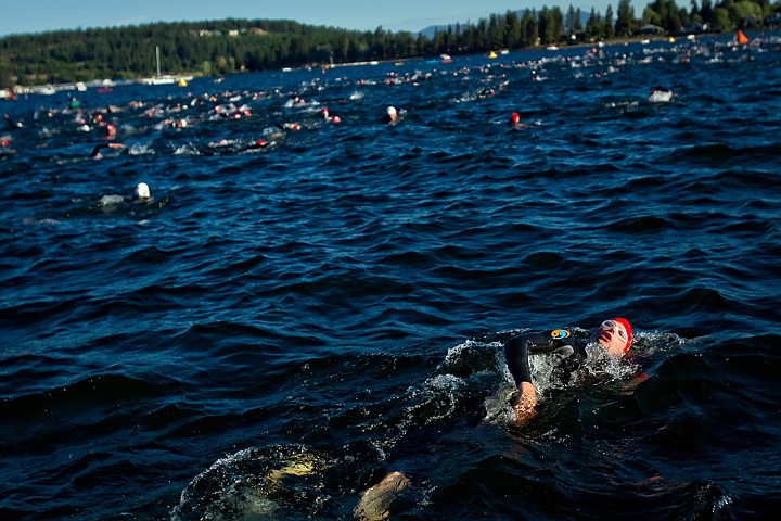 &lt;p&gt;JEROME A. POLLOS/Press A Ford Ironman Coeur d'Alene competitor makes her way back toward the pack of swimmers during the first leg of Sunday's event.&lt;/p&gt;