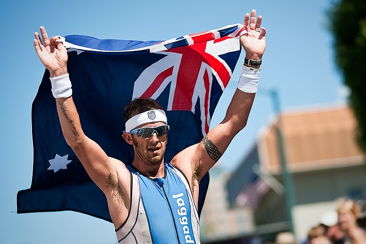 &lt;p&gt;SHAWN GUST/Press Chris McDonald waves an Australian flag overhead Sunday as he completes the 2010 Ford Ironman Coeur d'Alene in fifth place with a time of 08:48:30.&lt;/p&gt;