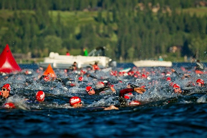 &lt;p&gt;JEROME A. POLLOS/Press Hundreds of triathletes converge at a turning point of the 2.4-mile swim during Sunday's Ford Coeur d'Alene Ironman.&lt;/p&gt;