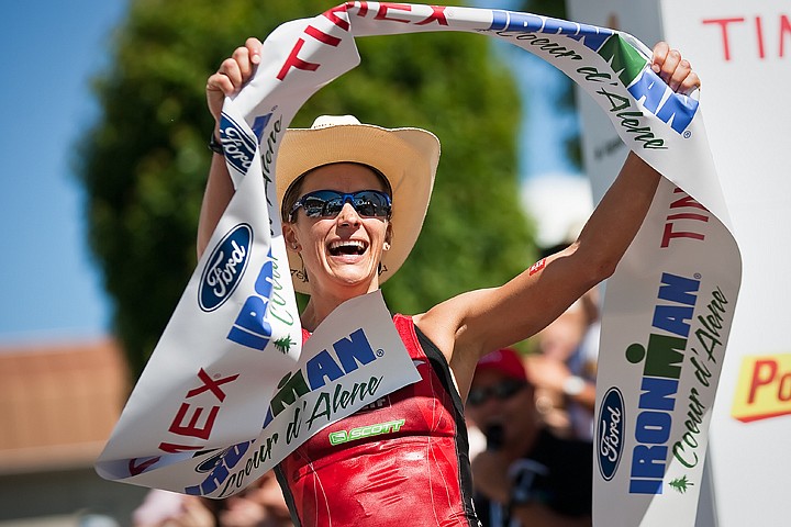 &lt;p&gt;SHAWN GUST/Press The 2010 Ford Ironman Coeur d'Alene women's champion, Linsey Corbin, raises the finish tape in celebration on Sunday.&lt;/p&gt;