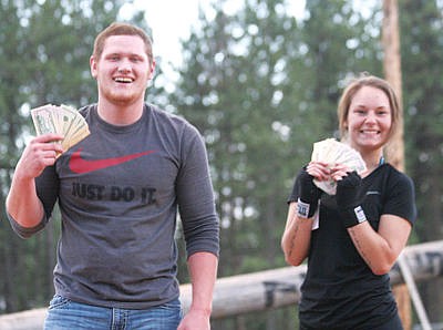 &lt;p&gt;Kraig Nelson, left, and Taylor Riggles earned the titles of Bull and Bullette of the Woods Saturday evening at J. Neils Park. (Seaborn Larson/The Western News)&lt;/p&gt;