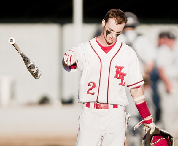 Kalispell Lakers second baseman Nate Bengtson throws his bat after striking out against the Missoula Mavericks at Griffin Field Tuesday night.