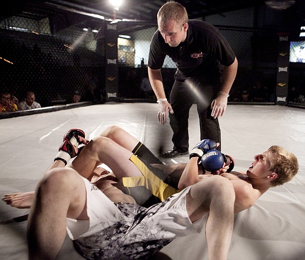 &lt;p&gt;Thirteen-year-old Exavier Treddenbarger submits 25-year-old Josh
Falcon with an arm bar during Ultimate Cage Wars at the Majestic
Valley Arena Saturday night.&lt;/p&gt;