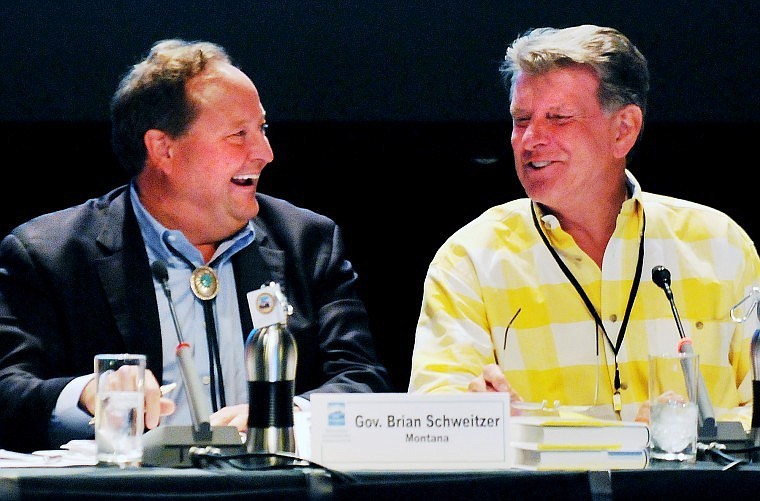 Montana Gov. Brian Schweitzer shares a laugh with Idaho Gov. Butch Otter.