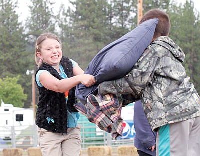 &lt;p&gt;Julianna Shumate, left, and Isaac Lamere mix it up in the Wimp of the Woods contest Friday evening during Loggers Days 2016. (Paul Sievers/The Western News)&lt;/p&gt;