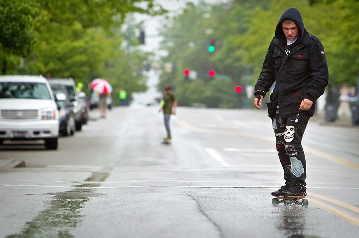 &lt;p&gt;JEROME A. POLLOS/Press Drew Freeman, 16, splashes through the puddles Monday as he skates on Sherman Avenue for National Skateboarding Day. Freeman was one of three skateboarders who braved the weather to take part in the event that limited access to the downtown thoroughfare for 15 minutes.&lt;/p&gt;