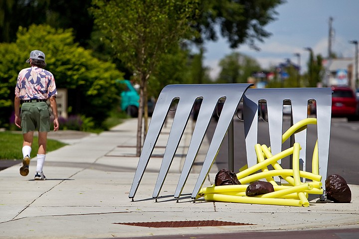 &lt;p&gt;JEROME A. POLLOS/Press Someone provided a little artistic addition to the giant fork bike racks on Fourth Street created by local artist Jason Schwartz. Pedestrians and motorists passed by the forks Friday which now include spaghetti and meatballs crafted from foam &quot;water noodles&quot; and plastic bags.&lt;/p&gt;