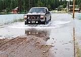 Water creeps over Echo Lake causeway
