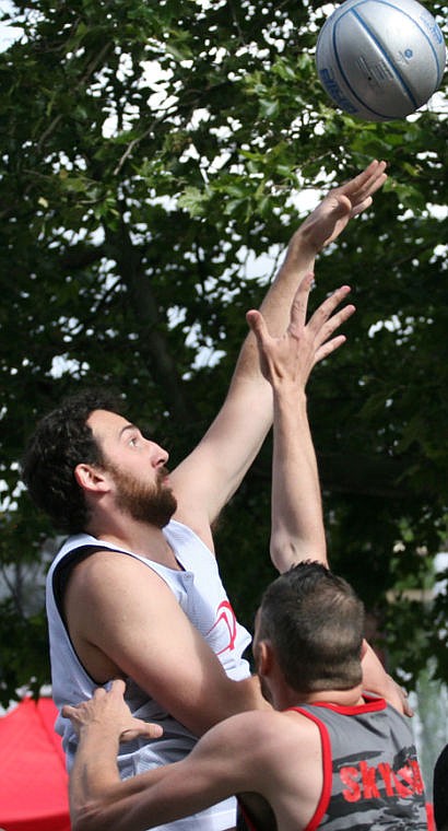 <p>Nick Fromm, a Lake City High, North Idaho College and Lewis-Clark State standout, puts up a shot in Precision Fitness' opening round win in the 6-foot and over elite division.</p>