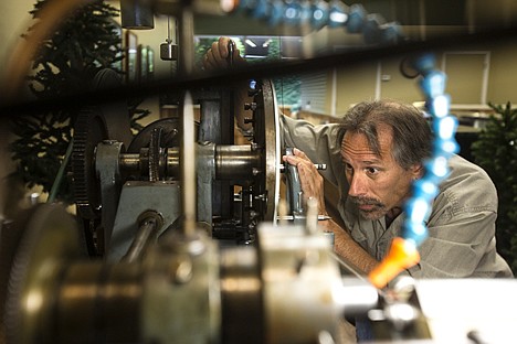 &lt;p&gt;At his new store &quot;Gem State Mint&quot; located in the Plaza Shops in downtown Coeur d'Alene, Randy Kramer works on a machine that transfers designs from a plaster cast onto a metal slug. The process is used in creating silver medallions.&lt;/p&gt;