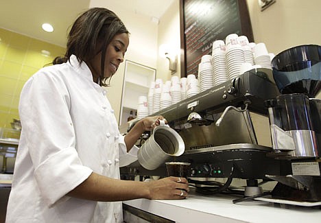 &lt;p&gt;This Wednesday, April 27, 2011 photo shows Sierra Schreiner as she prepares an iced coffee at Cafe Madeleine in San Francisco. Iced coffee drinks on today?s menus involve more than just pouring regular coffee over rocks. The beans used are premium, just as with hot coffee, and there are special preparations taken to bring out the best of the flavor. (AP Photo/Eric Risberg)&lt;/p&gt;